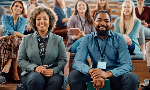 Total Rewards leaders attending an executive meeting focused on employee benefits, wellbeing strategy, and ROI alignment